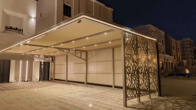 حداد مظلات الكويت - تركيب أبواب حديد خارجية بتصميم طولي من Kuwait Haddat